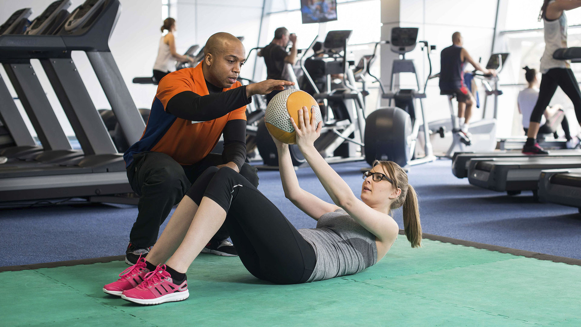 Places Personal Trainer working with a client